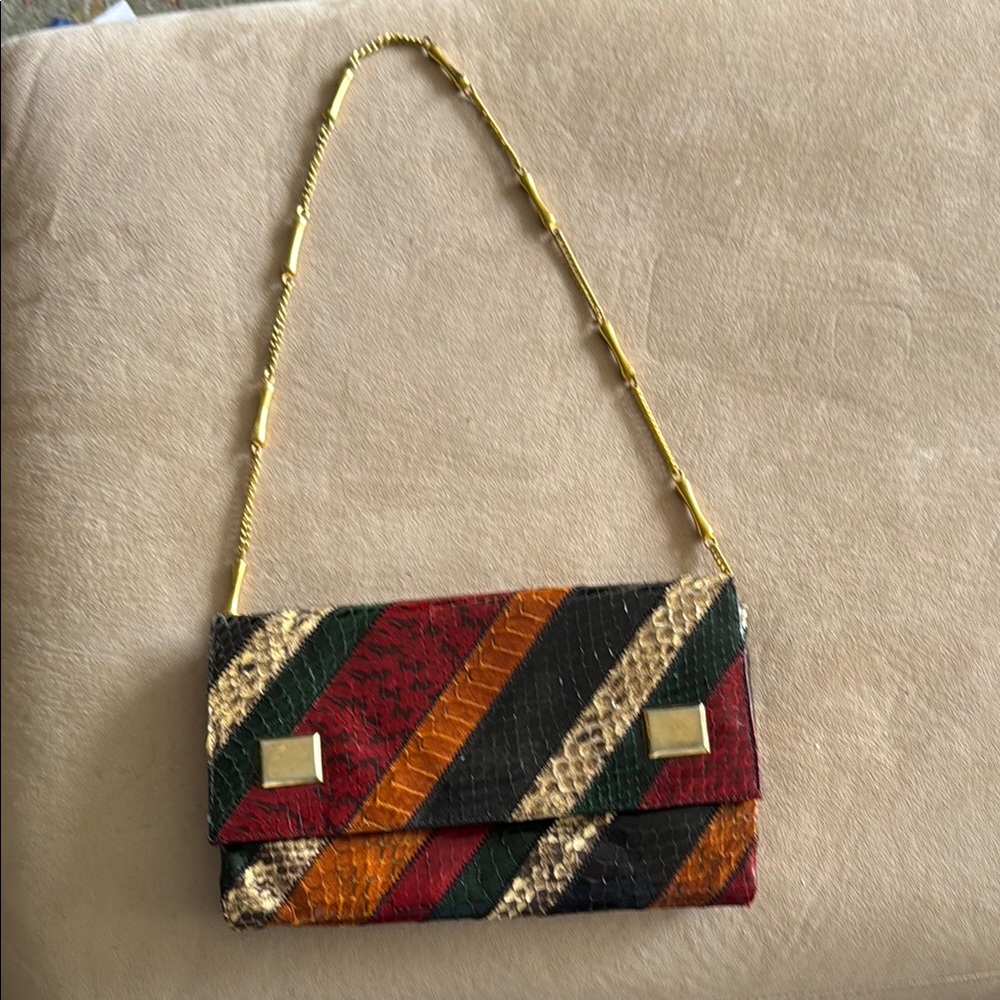Made in Spain . Genuine soft leather . Multicolor Striped Clutch Bag